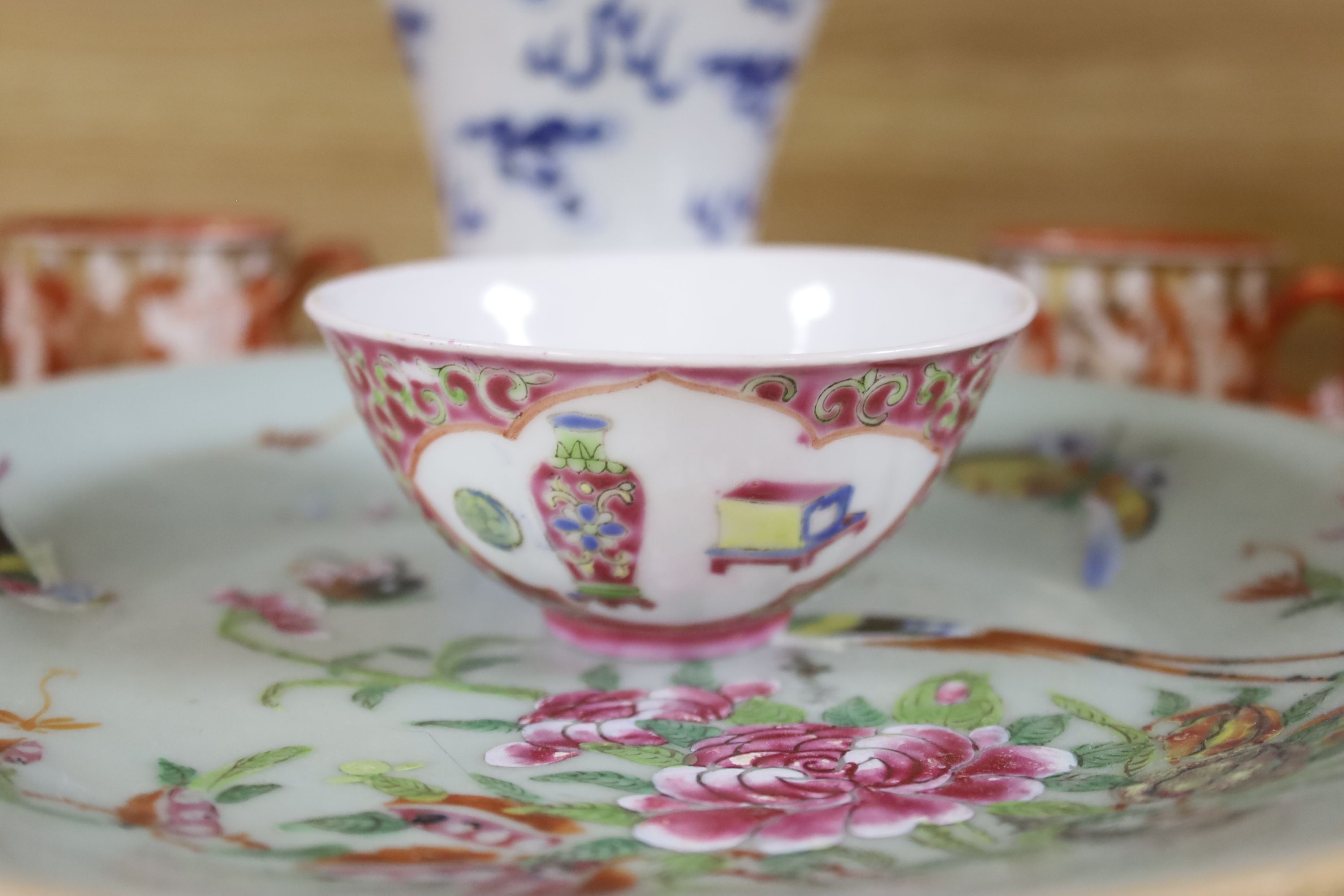 A Chinese blue and white dragon vase, a celadon glazed dish, a blue and white tea bowl and saucer and Kutani wares